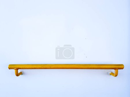 Photo for Yellow bar installed on white wall - Royalty Free Image