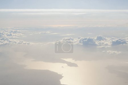 Greece Seene from Above, Aegean and Adriatic Sea, against sunlight in the afternoon