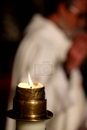 Photo for Burning candle in church - Royalty Free Image