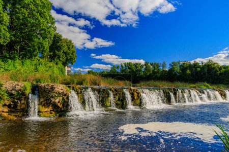 Photo for Kuldiga. Ventas-Rumba waterfall.The widest waterfall in Europe (249 m), of natural nature, a number of legends and historical events are associated with the waterfall. - Royalty Free Image
