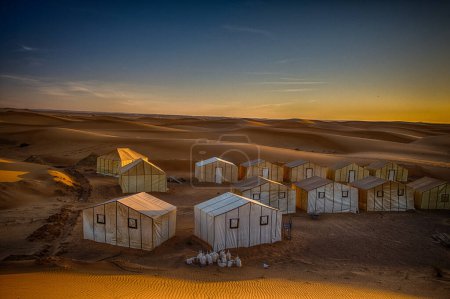 Photo for Desert tents at a luxury camp site at Erg Chebbi in the Moroccan Sahara - Royalty Free Image