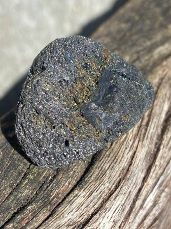 Photo for Surface of lava rock scoria black pumice containing metal silver platinum and gold - Royalty Free Image