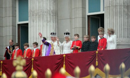 Photo for London, England, UK. 6th May, 2023. King CHARLES III and Queen Consort Camilla are seen on the balcony of Buckingham Palace following the coronation. King Charles, Queen Camilla wearing crown jewels - Royalty Free Image