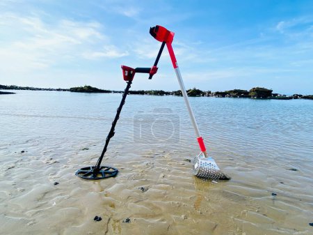 Photo for Sand scoop metal detecting metal detector beach stock photo - Royalty Free Image