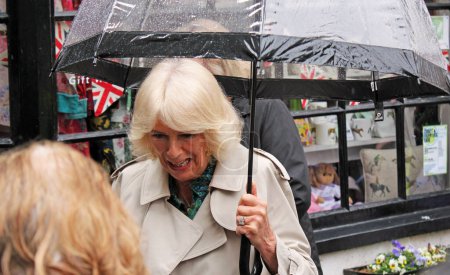Photo for Rye, East Sussex, UK- 16.05.2024: Queen Consort Camilla visits Rye Church and Lamb house to celebrate Literature history meets crowds in the rain - Royalty Free Image