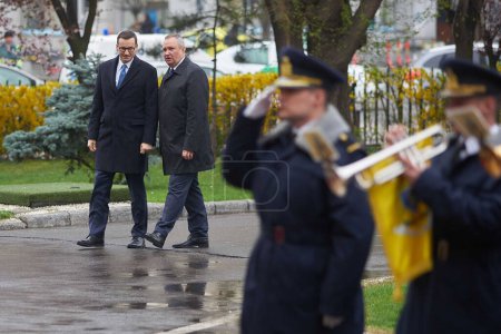 Photo for Bucharest, Romania. 28th Mar, 2023: The Polish Premier Mateusz Morawiecki (L) is welcomed by Romanian Premier Nicolae Ciuca, during his official visit to Romania, at the Victoria Palace. - Royalty Free Image