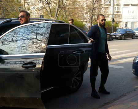 Photo for Bucharest, Romania. 10th Apr, 2023: Andrew Tate (R) and his brother Tristan Tate arrive at the Directorate for Investigating Organized Crime and Terrorism DIICOT - Royalty Free Image