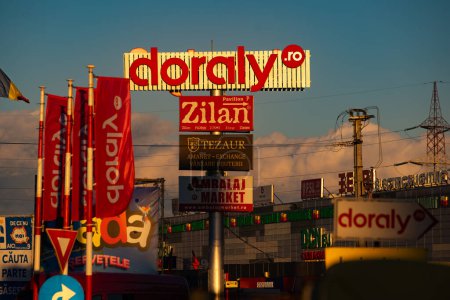 Photo for Afumati, Romania - January 16, 2024: The Expo Market Doraly logo is seen on a high advertising pole. - Royalty Free Image