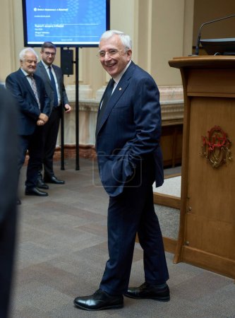 Photo for Bucharest, Romania. 15th May, 2024: Mugur Isarescu, the Governor of the National Bank of Romania (BNR), talks to the members of the bank's board of directors after presenting the Quarterly Inflation Report, at the headquarters of the BNR in Bucharest - Royalty Free Image