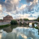 Beautiful view of medieval Saint Angelo castle and Vittorio Emanuele II Bridge over Tiber river in Rome, Italy	