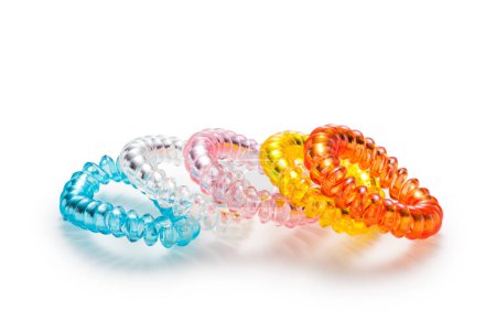 Colorful telephone wire hair tie on white backgound