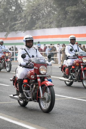 Photo for Kolkata Police Sergeant on motorcycle preparing for taking part in the upcoming Indian Republic Day parade at Indira Gandhi Sarani, Kolkata, West Bengal, India on January 2023 - Royalty Free Image