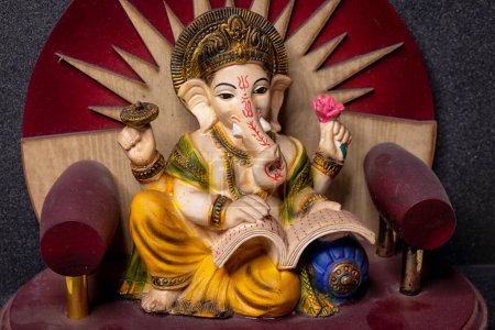 Photo for Closeup picture of Lord Ganesha, is one of the most worshipped deities in Hinduism. Lord Ganesha considered as the goddess of new Beginnings, wisdom and luck - Royalty Free Image
