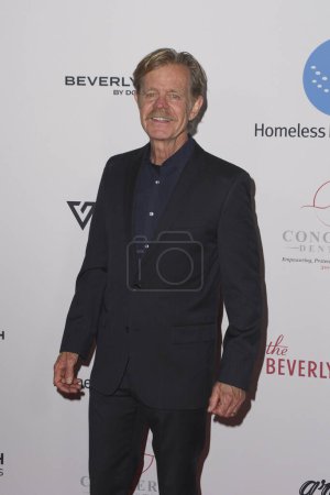 Téléchargez les photos : Beverly Hills, CA États-Unis - avril 22, 2023 : William H Macy assiste au gala de collecte de fonds Homeless Not Toothless. - en image libre de droit