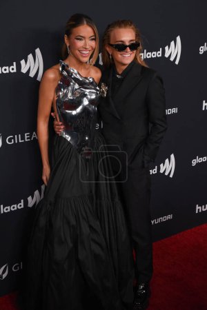Photo for Beverly Hills, CA USA - March 14, 2024: Chrishell Stause, G Flip attends the 35th Annual GLAAD Awards. - Royalty Free Image