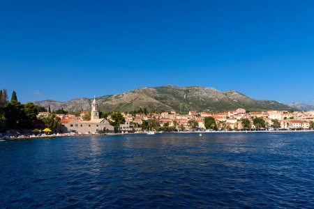 Cavtat, Croatia - August 9, 2023: Cavtat (Croatia) is a popular tourist destination with many hotels and restaurants. Beautiful town Cavtat in southern Dalmatia magic mug #703867018