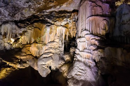 Exploring beautiful Postojna cave in Slovenia the most visited european cave. Thousands of stalagmites and stalactites