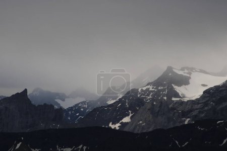 Photo for Moodz dark sky over mountains in the Bernese Oberland. - Royalty Free Image