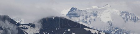 Photo for Mountains Schwarzhorn and Schreckhorn seen from Mount Brienzer Rothorn. - Royalty Free Image