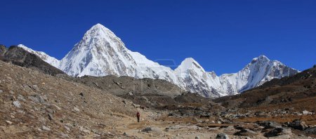 Photo for Foot path leading towards the Everest Base Camp and snow covered Mount Pumori, Nepal. - Royalty Free Image