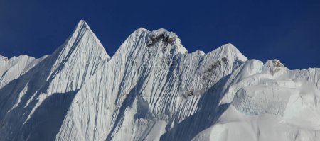 Photo for Stunning shaped sharp mountain ridge and peak seen from Gorakshep, Nepal. - Royalty Free Image