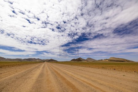 Wide gravel road in the desert Namib Desert Namibia