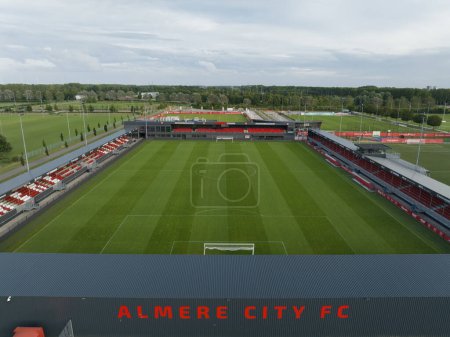 Photo for Almere, 16th of July, 2023, The Netherlands. Aerial drone video of the Yanmar Stadium, the home base of Almere City FC. - Royalty Free Image
