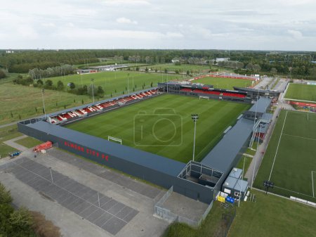 Photo for Almere, 16th of July, The Netherlands. Aerial drone view of the Yanmar Stadium, the home base of Almere City FC. - Royalty Free Image