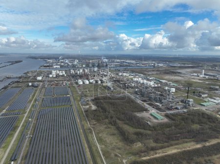 Petrochemical industry. Petroleum oil refinery in Moerdijk, The Netherlands. Sustainable energy resources by solar panels.