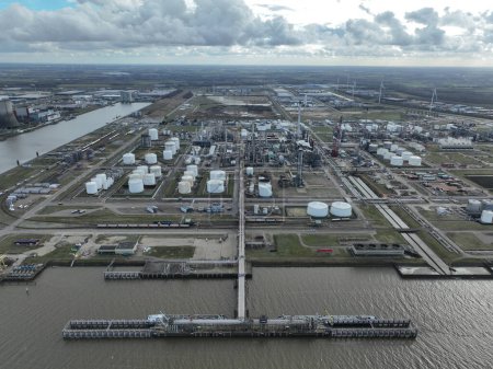 Petrochemical complex of factories in the Moerdijk port and industrial area. Birds eye aerial drone view.
