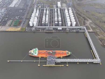 Photo for Antwerp, province of Antwerp, Belgium, March 3th, 2024: Vopak Terminal Left bank in the port of Antwerp. Storage import export distribution and hub for Chemicals, Oleochemicals. Services are Heating - Royalty Free Image