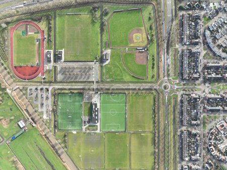 Amateur sports field, aerial top down images, outlines of different types of sports fields. Complex facility overview.