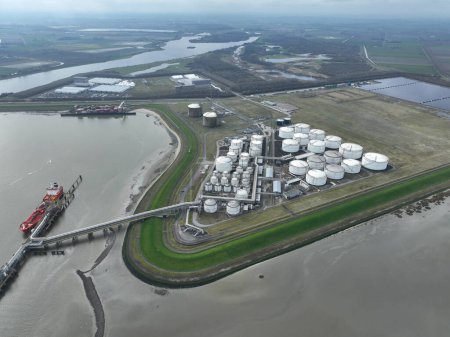 Aerial drone view on petroleum shipping terminal in the port of Terneuzen, The Netherlands.
