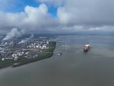 Photo for Aerial drone view on Chemical Terneuzen a very large complex of chemical factories. production of plastics. Ethylene , propylene , butadiene and benzene are produced here. Terneuzen, The Netherlands. - Royalty Free Image