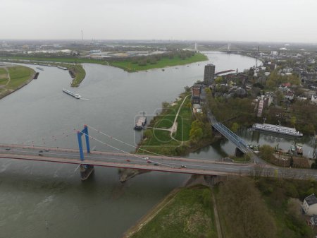 The Friedrich-Ebert-Brucke is a cable-stayed bridge for road traffic over the Rhine near the German city of Duisburg. Aerial drone view.