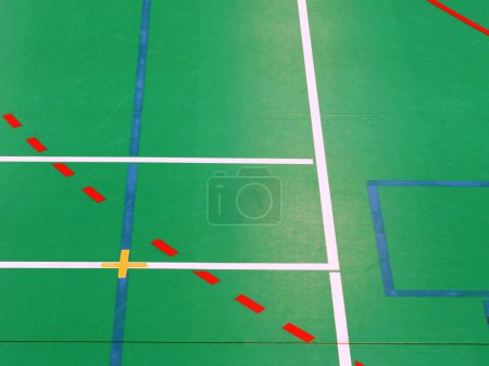 Photo for School sporting hall. Detail of markings on the floor in the gym. Renewal lines in playfield - Royalty Free Image