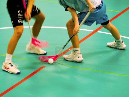 Photo for Match of senior pupils in floorball, Mlada Boleslav, Czechia. December 4, 2022. Blurry movement of floor ball  players. Students cup in floorball - Royalty Free Image