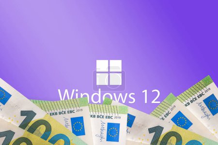 Téléchargez les photos : Le système d'exploitation est coûteux.Windows 12.A Nouvelle mise à jour du système d'exploitation de l'ordinateur microsoft.Euro monnaie papier monnaie au premier plan.Les affaires sont plus coûteuses.Telsiai, Lituanie.05-20-2023. - en image libre de droit
