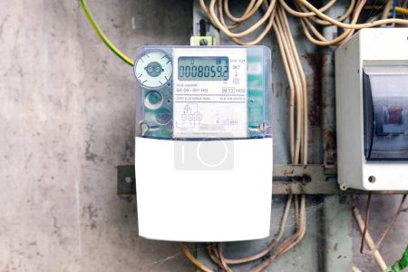 White blank mockup, advertisement. Household electricity meter in the apartment building.