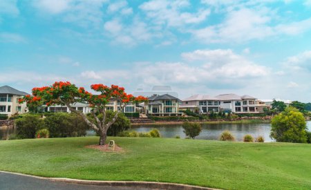 Photo for Panoramic view of the beautiful Glades Golf Course, one of Australias most prestigious resort golf courses in Queensland, Gold Coast. Designed by Australian golfing icon, Greg Norman. - Royalty Free Image