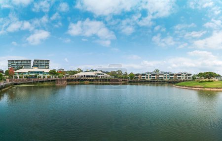Photo for Panoramic view of the Glades Golf Course, one of Australia's most prestigious resort golf courses in Queensland, with stunning gardens, boardwalks and waterway. - Royalty Free Image