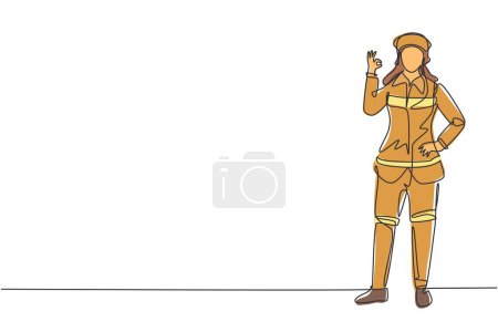 Illustration for Single one line drawing female firefighter stood wearing helmet uniform with gesture okay and hand on waist work to extinguish fire at building. Continuous line draw design graphic vector illustration - Royalty Free Image