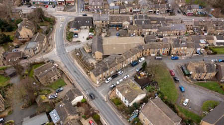 Foto de Aerial drone photo of the Village of Netherton near Huddersfield, in the Kirklees metropolitan borough of West Yorkshire, England showing the residential houses in the winter time - Imagen libre de derechos