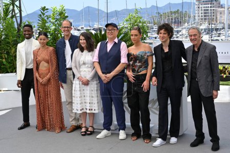 Photo for CANNES, FRANCE. May 27, 2023: Mamoudou Athie, Leah Lewis, Pete Doctor, Denise Ream, Peter Sohn, Adele Exarchopoulos, Vincent Lacoste and Jim Morris at the photocall for Elemental at the 76th Festival de Cannes - Royalty Free Image
