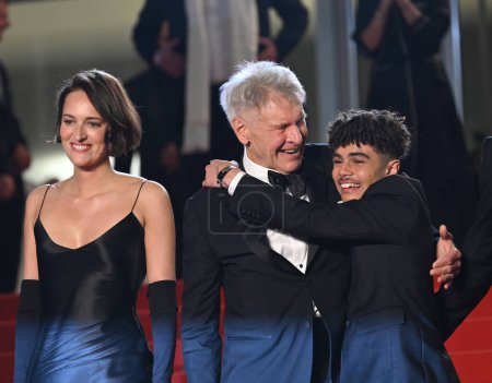 Photo for CANNES, FRANCE. May 18, 2023: Phoebe Waller-Bridge, Harrison Ford and Ethann Isidore at the premiere of Indiana Jones and the Dial of Destiny at the 76th Festival de Cannes - Royalty Free Image