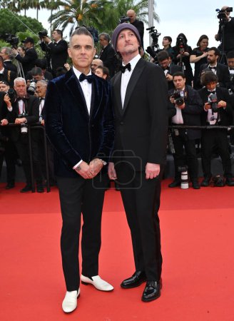 Téléchargez les photos : CANNES, FRANCE. 20 mai 2023 : Robbie Williams et Michael Gracey aux Killers of the Flower Moon en première au 76e Festival de Cannes - en image libre de droit