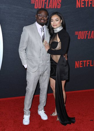 Photo for LOS ANGELES, CA. June 26, 2023:  Lil Rel Howery and Verina Howery at the Los Angeles special screening for The OutLaws at the Regal LA Live - Royalty Free Image