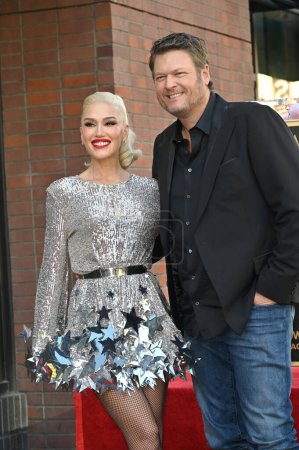 Photo for LOS ANGELES, CA. October 19, 2023: Gwen Stefani and Blake Shelton on Hollywood Boulevard where Gwen Stefani was honored with a star on the Hollywood Walk of Fame. - Royalty Free Image