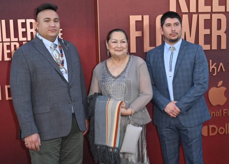 Photo for LOS ANGELES, CA. October 16, 2023:  Christopher Cote, Janis Carpenter and Braxton Redeagle, Osage Language Consultants at the Los Angeles premiere for Killers of the Flower Moon at the Dolby Theatre, Hollywood - Royalty Free Image