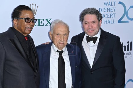 Photo for LOS ANGELES, CA. October 05, 2023:  Herbie Hanock, Frank Gehry and Gustavo Dudamel at the Los Angeles Philhamonic Gala marking the 20th anniversary of the Walt Disney Concert Hall - Royalty Free Image